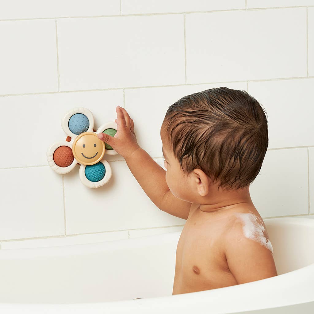 Itzy Ritzy Pop & Whirl™ - Bath + Travel Toy: Strawberry