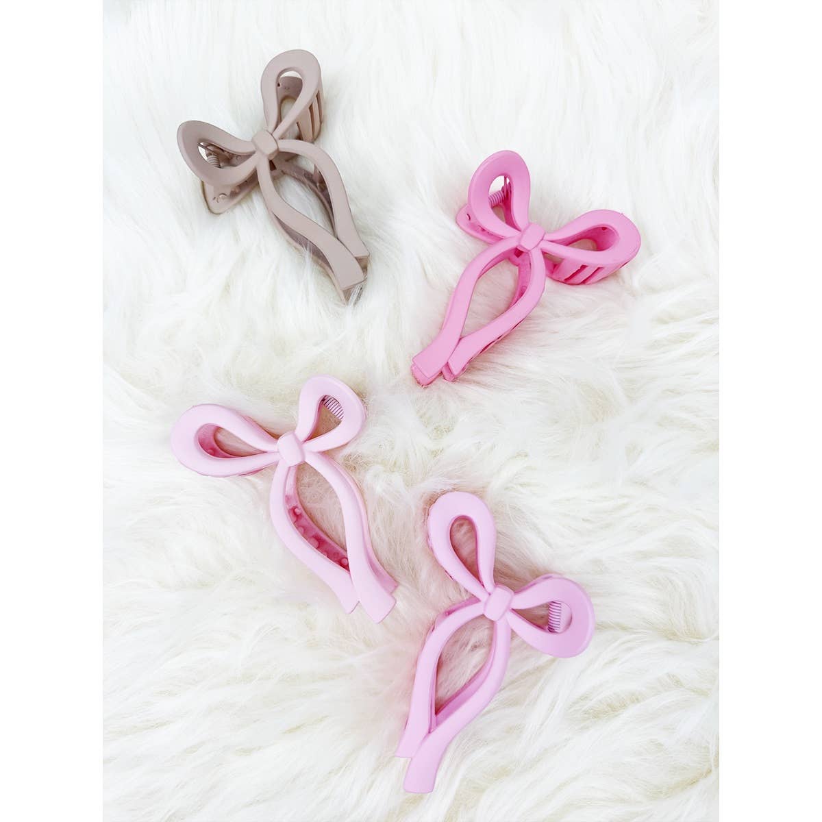 Assorted Pink and Taupe Shades of Bow Clip claw