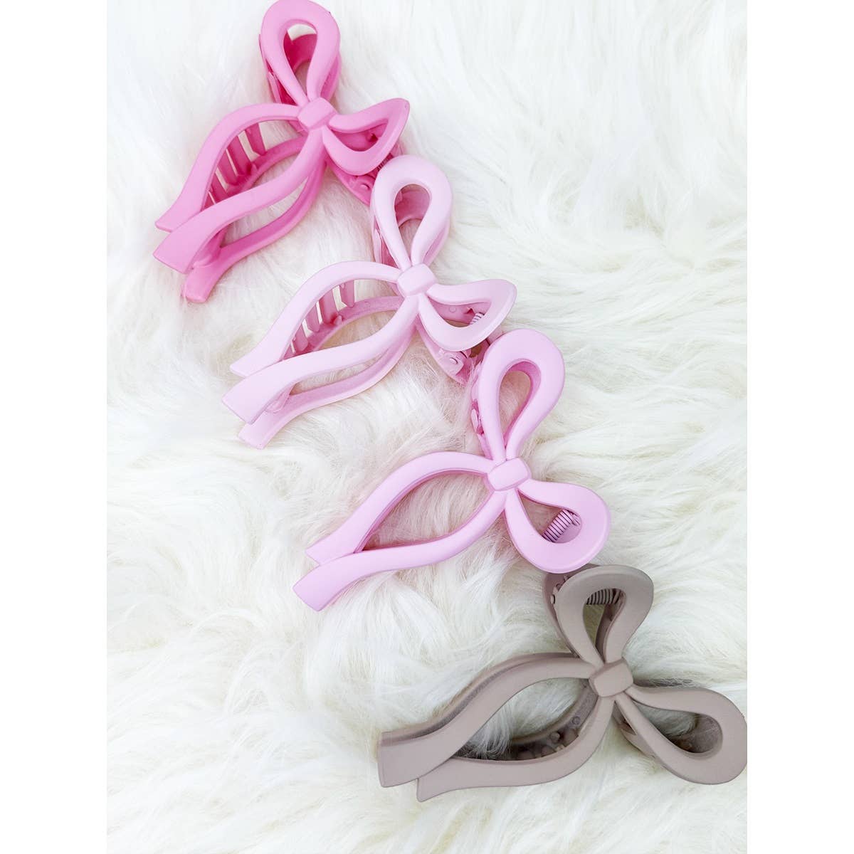 Assorted Pink and Taupe Shades of Bow Clip claw