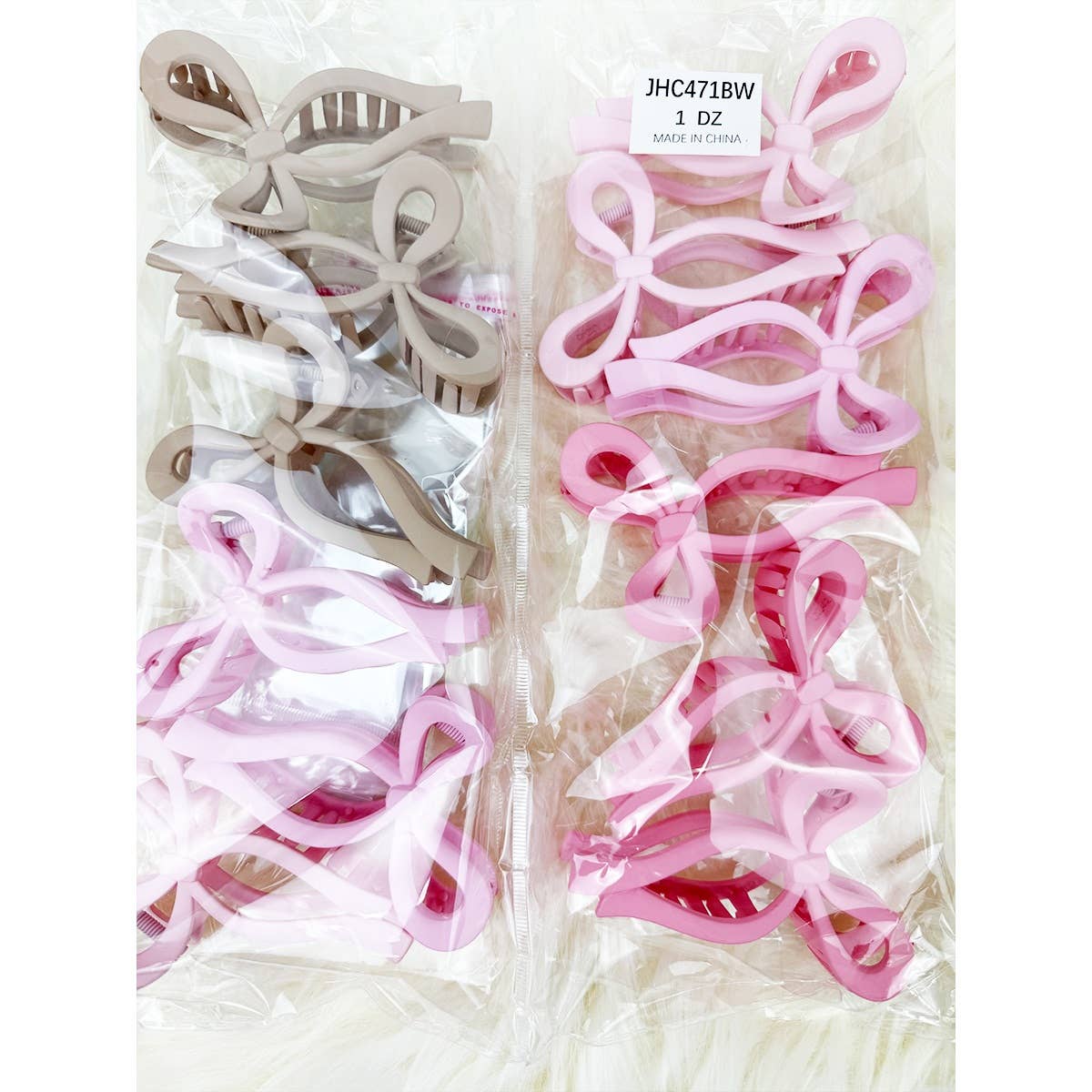 Assorted Pink and Taupe Shades of Bow Clip claw