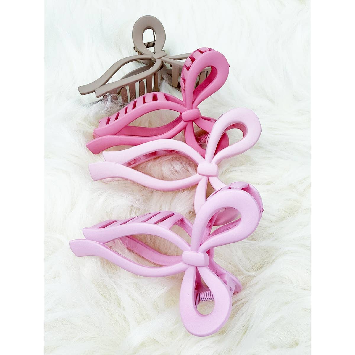 Assorted Pink and Taupe Shades of Bow Clip claw