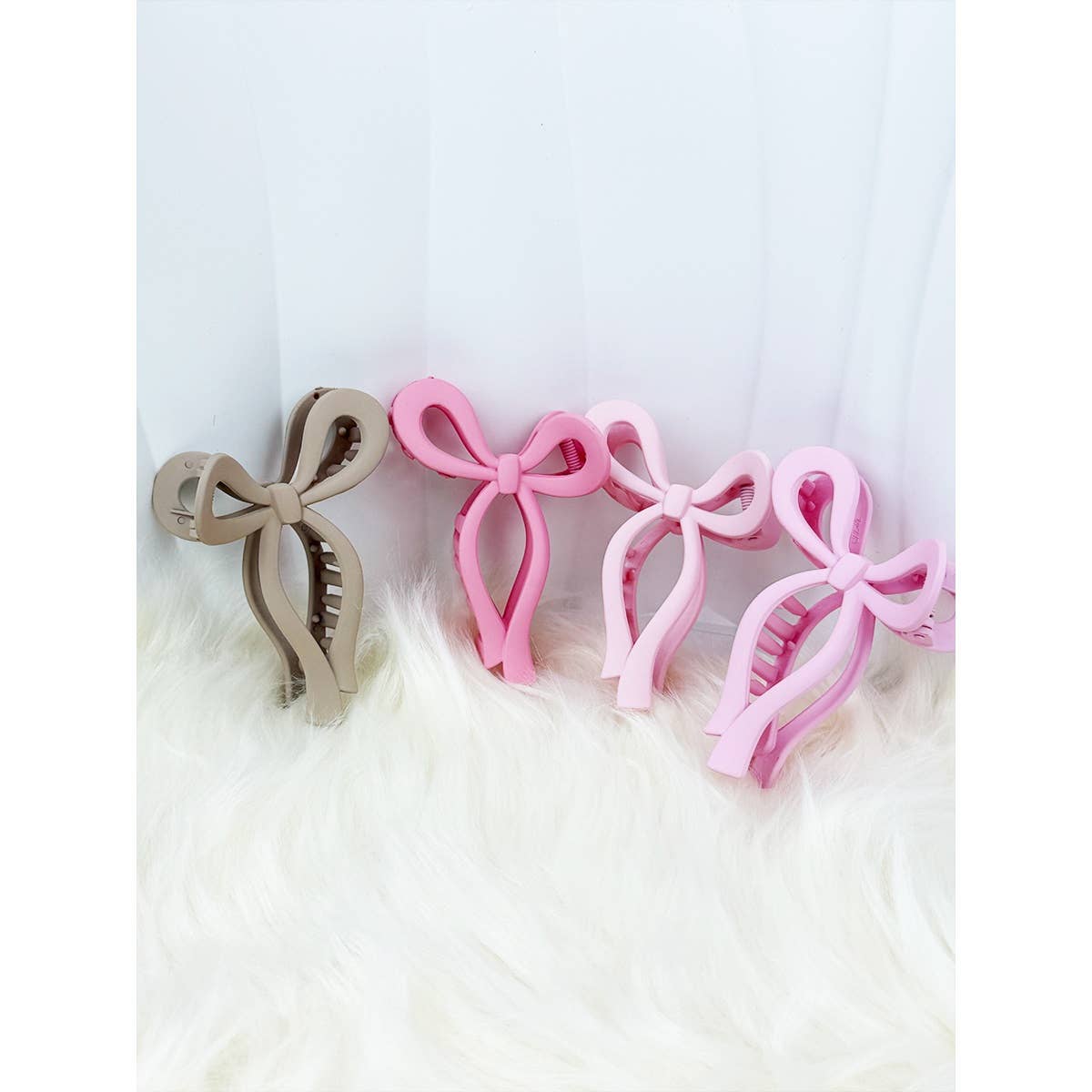 Assorted Pink and Taupe Shades of Bow Clip claw